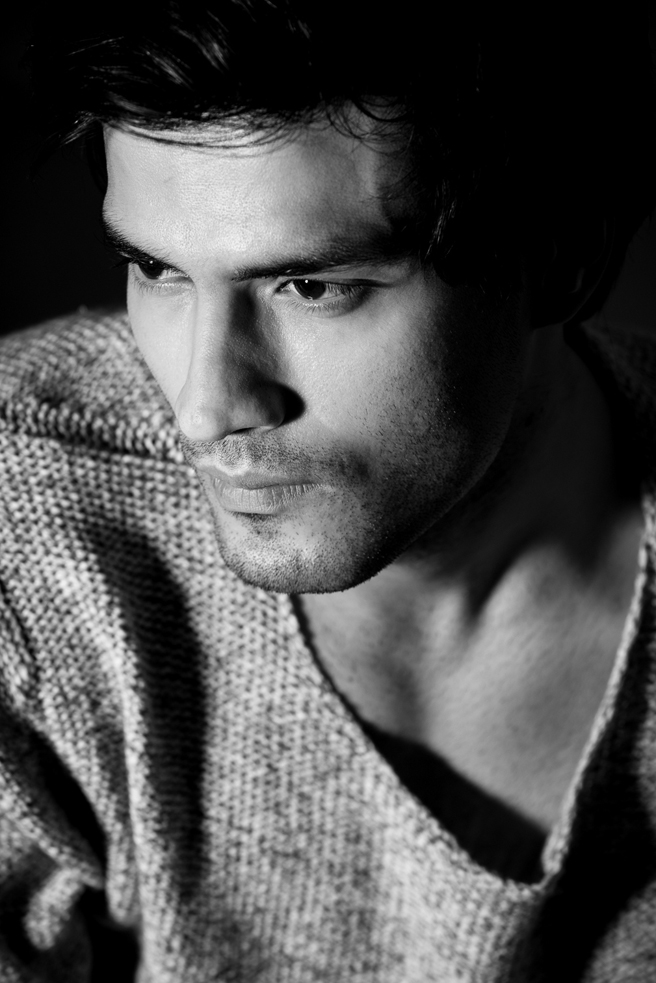 Black and white fashion portrait of a male model by photographer Alex Felez