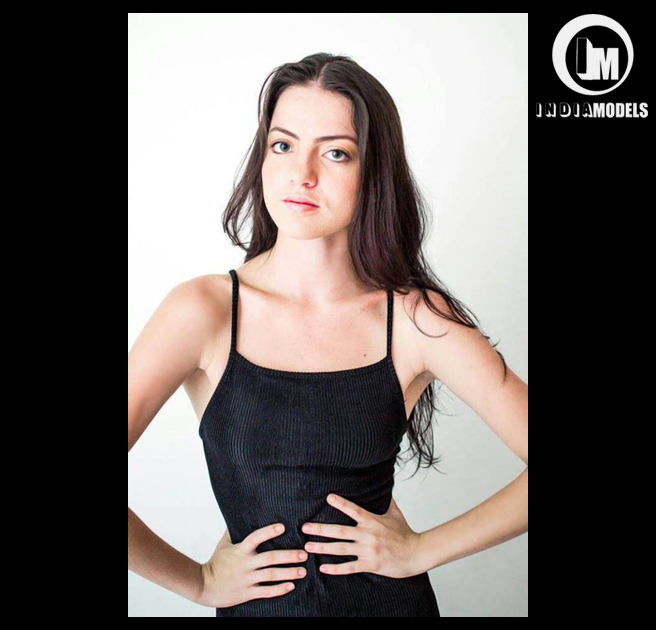 Delhi based international fashion model Pmella Ivinin in Black eveing dress