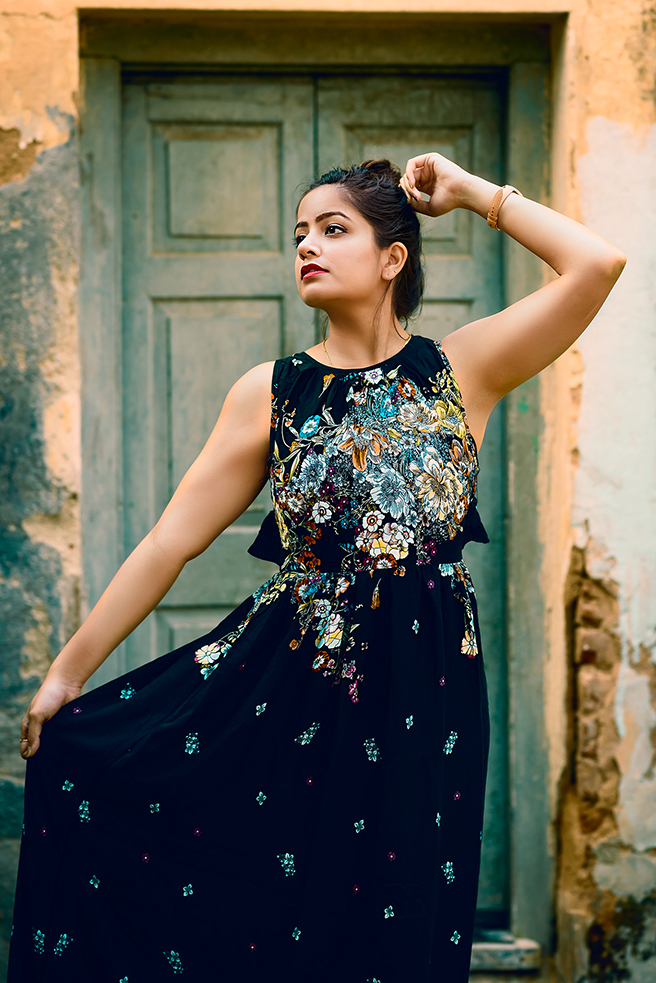 Bangalore based model Khushi Sharma in a black floral dress