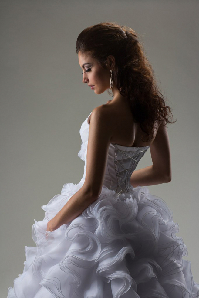 Ukrainian fashion model Olga Moroz in a white bridal dress. Bollywood India