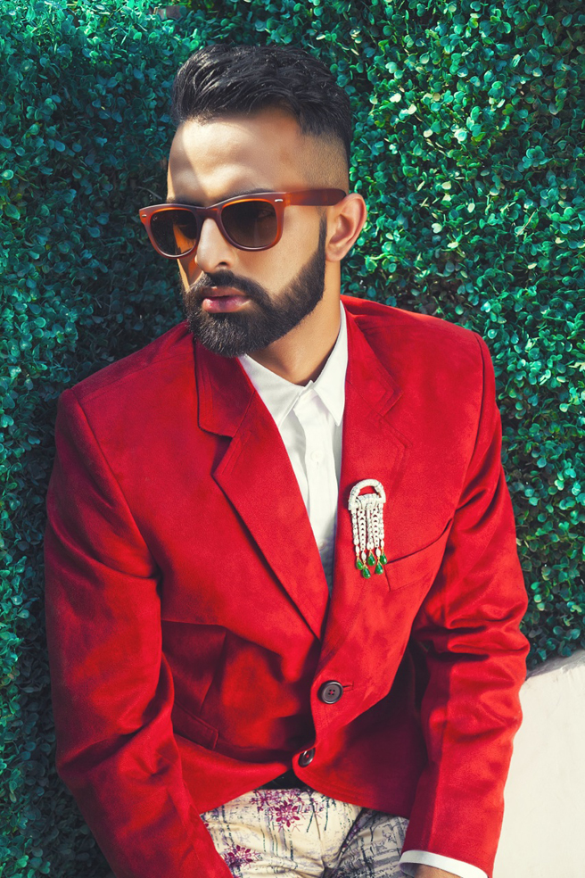 British fashion model and athlete Paranveer Singh in a blue suit