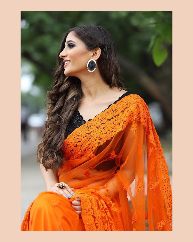 Beutiful Indian model Shanaya Sharma Wearing a orenge saree