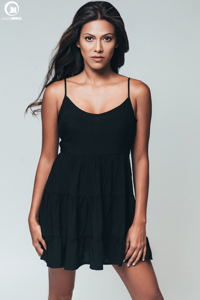 new York based Indian models photographed in a stunning black dress